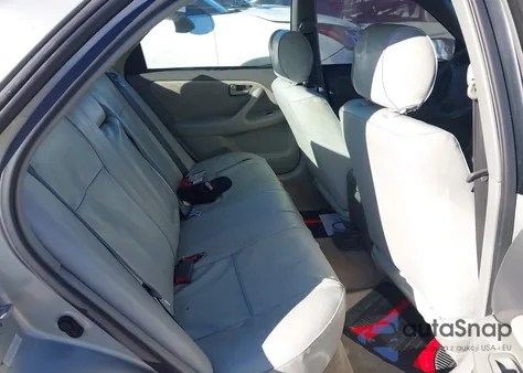 2001 Toyota Camry Ce z USA, uszkodzony, nr VIN 4T1BG22K61U107414